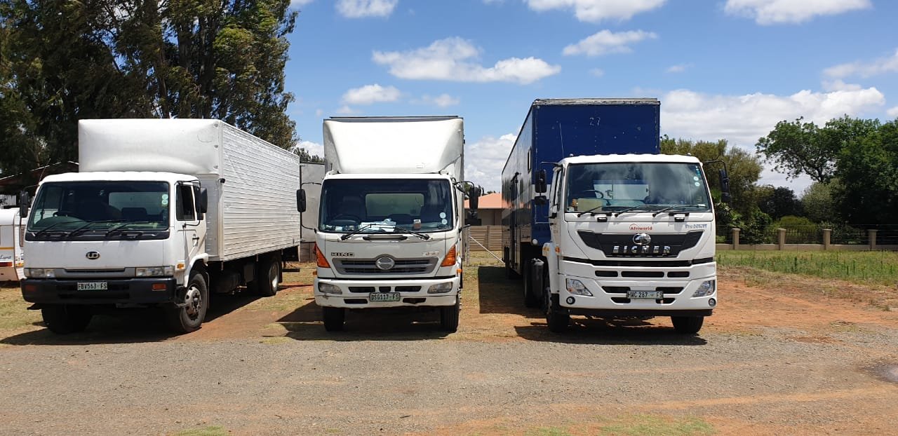 City on the Move fleet of three trucks lined up and ready for deployment
